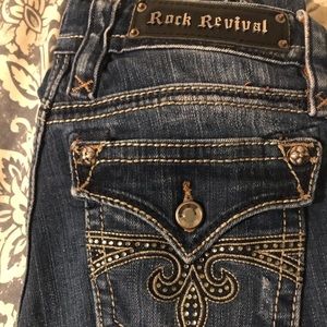 Rock Revival boot cut crystal flap pocket jeans